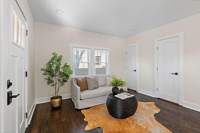 sitting room featuring dark hardwood / wood-style flooring