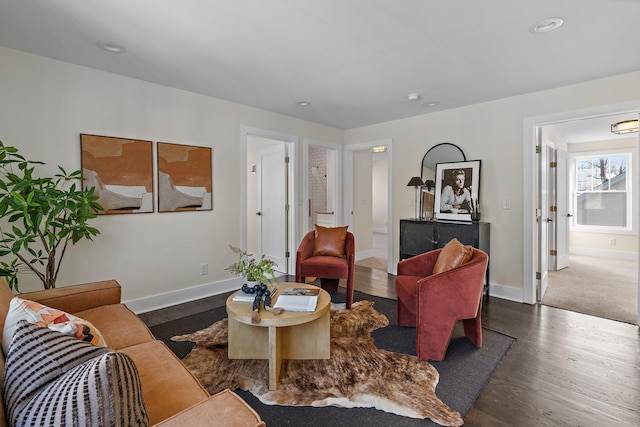 living room with dark hardwood / wood-style floors