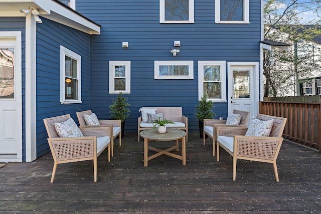 wooden terrace with outdoor lounge area