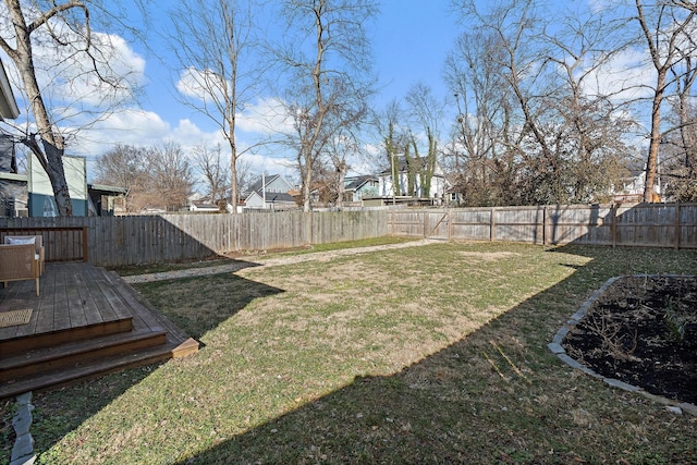 view of yard with a wooden deck