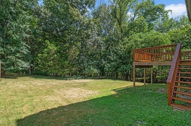 view of yard featuring a wooden deck