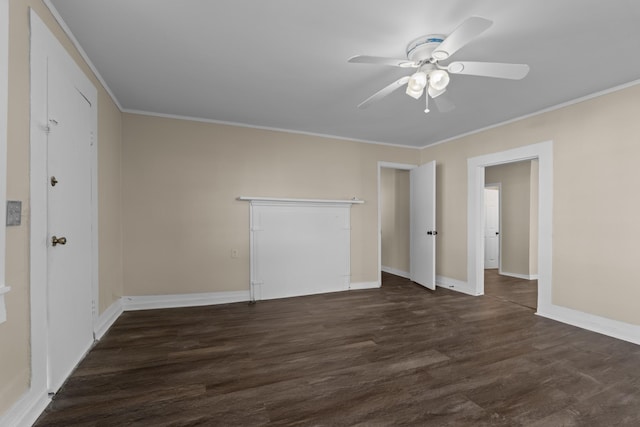 unfurnished bedroom with ceiling fan, ornamental molding, and dark hardwood / wood-style flooring