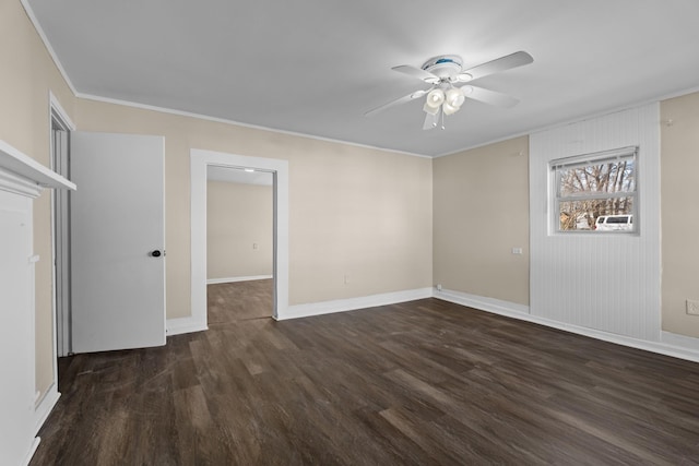 unfurnished room featuring dark wood-type flooring, ornamental molding, and ceiling fan