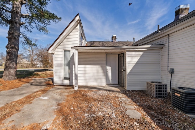 back of property with central AC unit