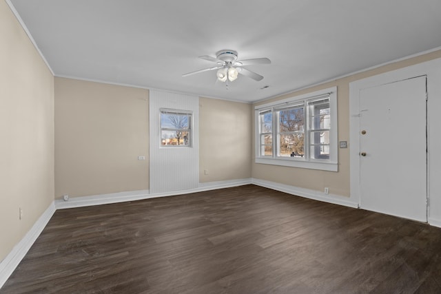 interior space featuring crown molding, ceiling fan, and dark hardwood / wood-style flooring