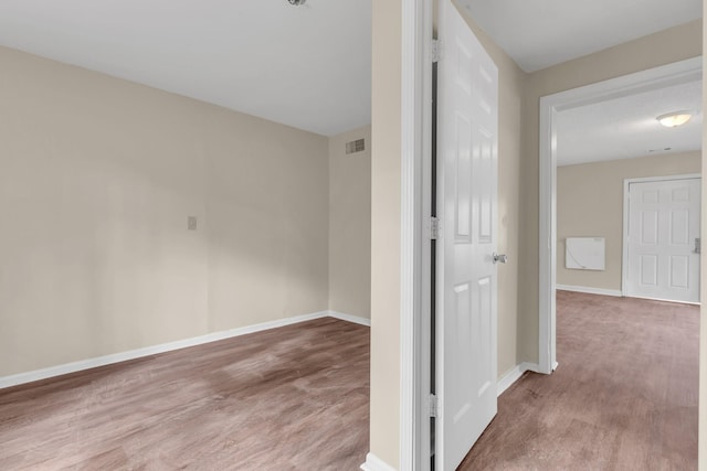 hall featuring hardwood / wood-style floors