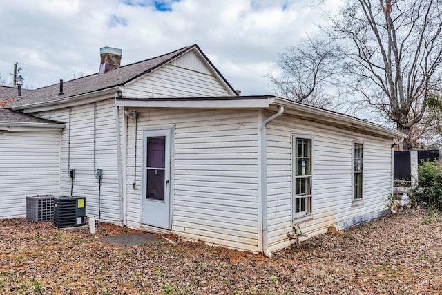 back of house with cooling unit