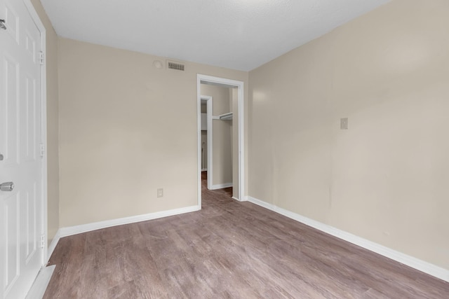 unfurnished bedroom featuring light hardwood / wood-style flooring