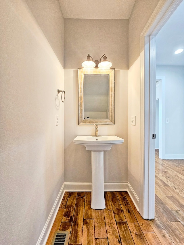 bathroom featuring hardwood / wood-style floors