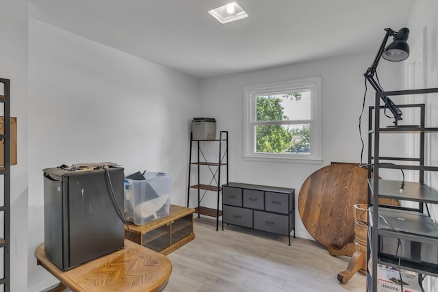 sitting room with light hardwood / wood-style floors