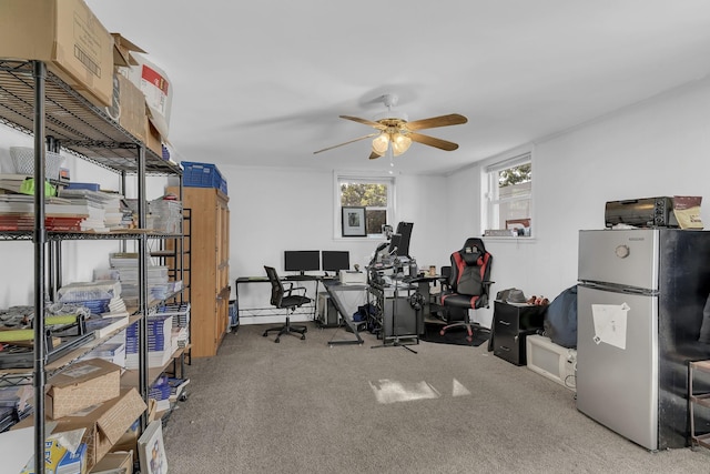 workout area with ceiling fan and carpet floors