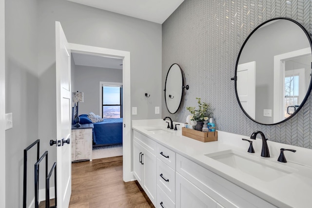 bathroom featuring vanity and hardwood / wood-style flooring