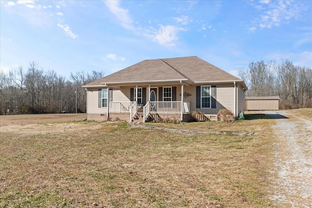 view of front of property with a porch and a front yard