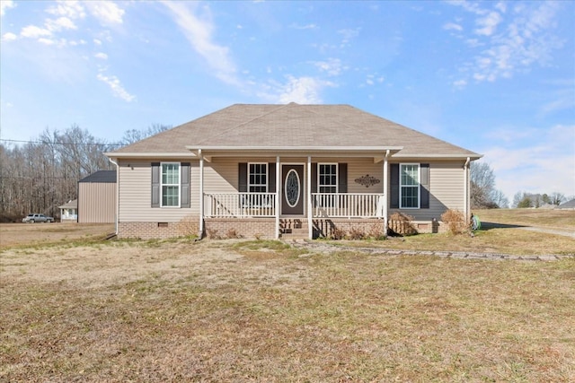 ranch-style home featuring a front yard and a porch