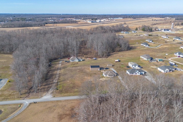 birds eye view of property featuring a rural view