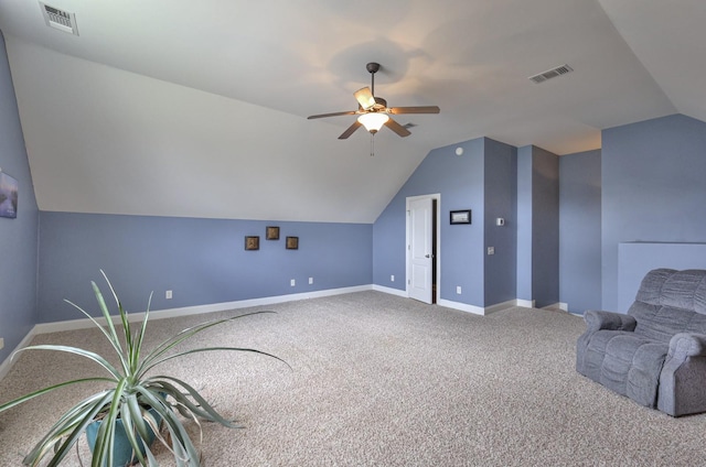 additional living space with lofted ceiling, ceiling fan, and carpet flooring