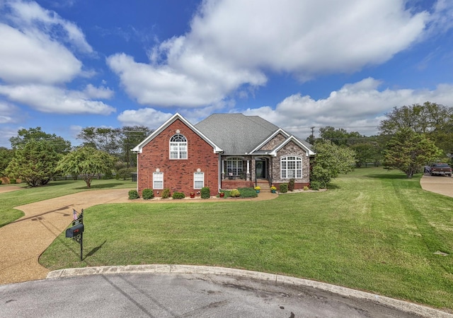 view of front of house with a front lawn