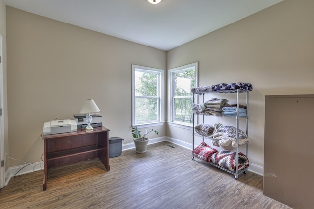 miscellaneous room featuring hardwood / wood-style floors