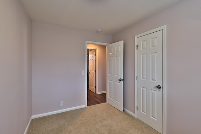 unfurnished bedroom with carpet