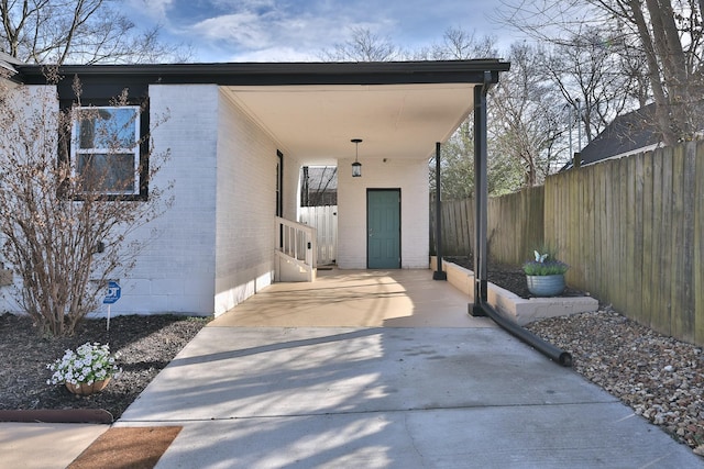 view of patio featuring a carport