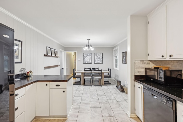 kitchen featuring crown molding, black appliances, and white cabinets