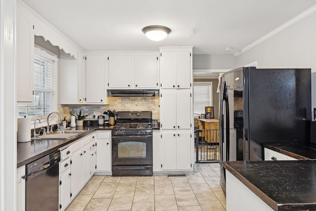 kitchen with white cabinetry, sink, and black appliances