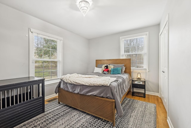 bedroom with light hardwood / wood-style flooring