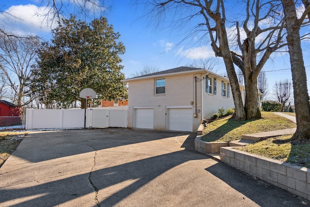 view of side of home with a garage