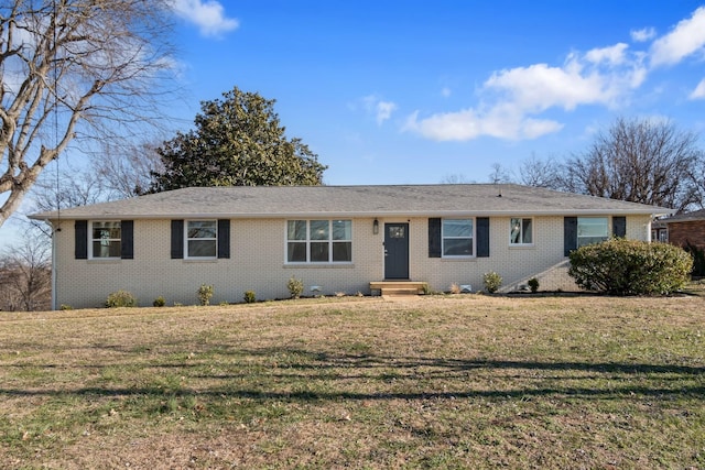 single story home with a front lawn