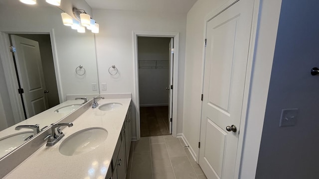 bathroom featuring vanity and tile patterned floors