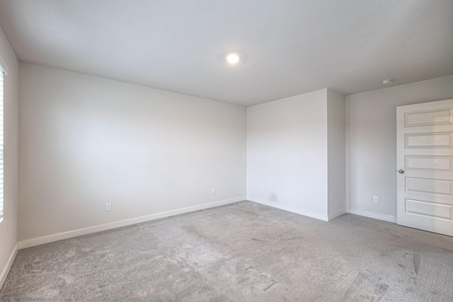 empty room featuring carpet floors