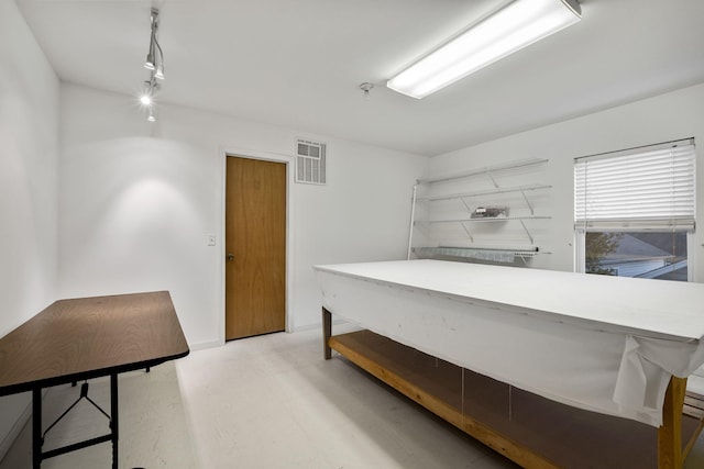 miscellaneous room featuring light hardwood / wood-style floors