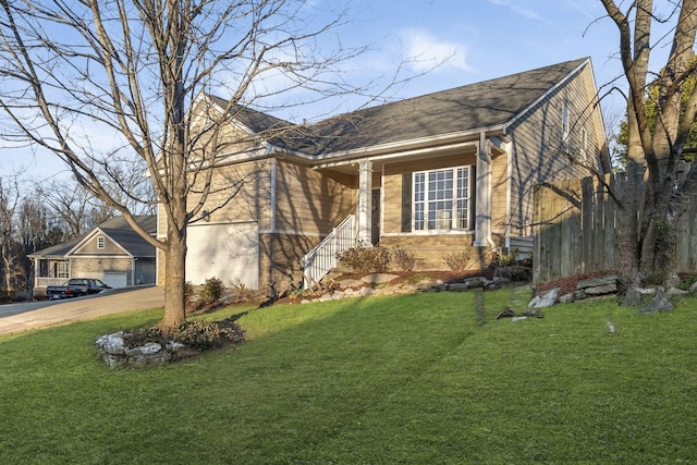 ranch-style house with a garage and a front lawn