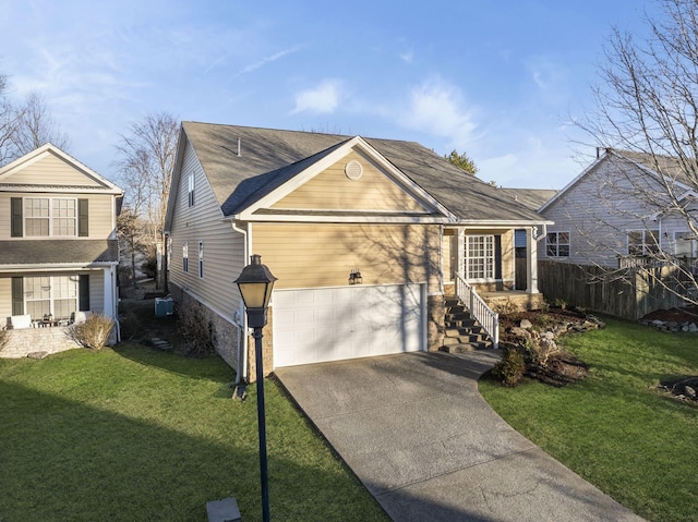 view of front of home featuring a garage and a front yard