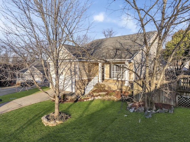 view of front of home with a front lawn