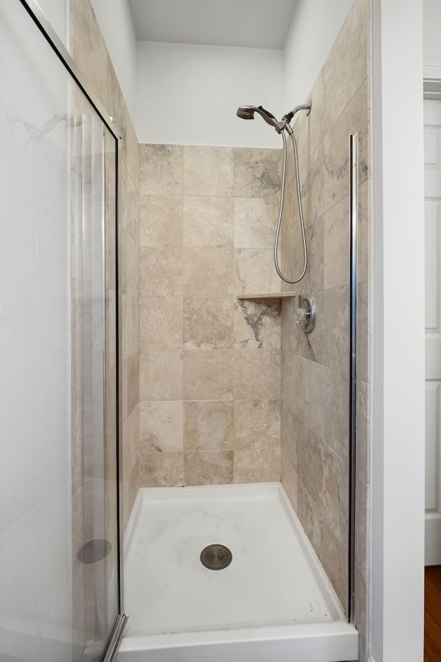 bathroom featuring walk in shower