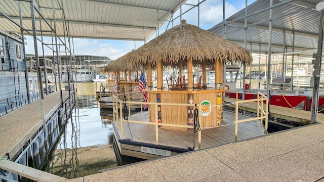 view of dock with a water view