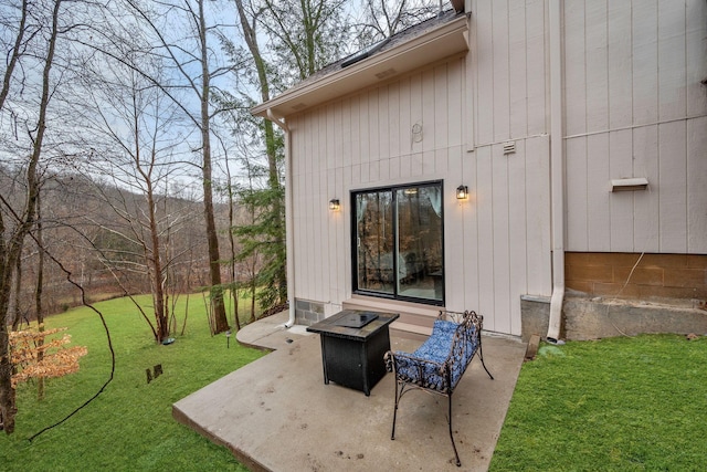 view of patio with an outdoor fire pit