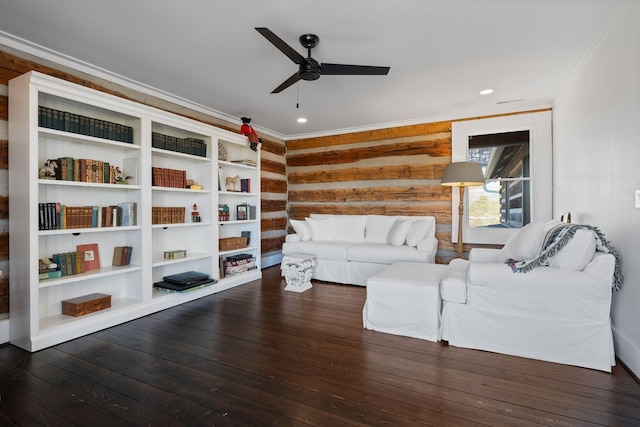 living room featuring crown molding, dark hardwood / wood-style floors, and ceiling fan