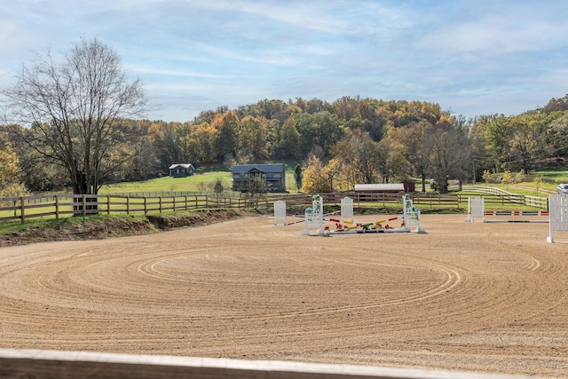 view of home's community featuring a rural view