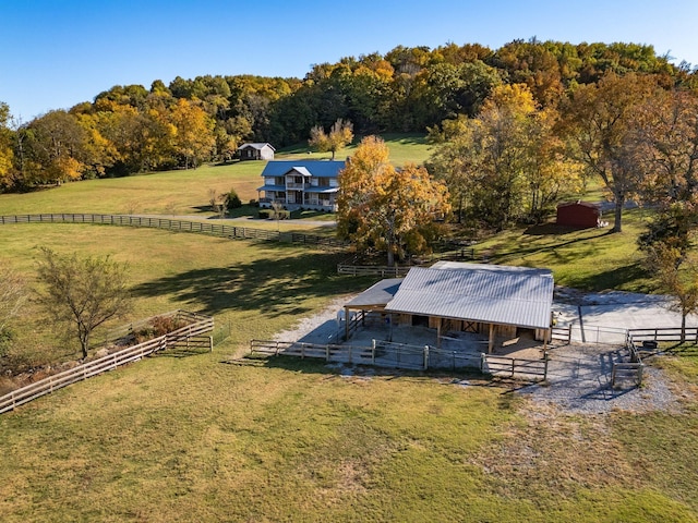 birds eye view of property featuring a rural view