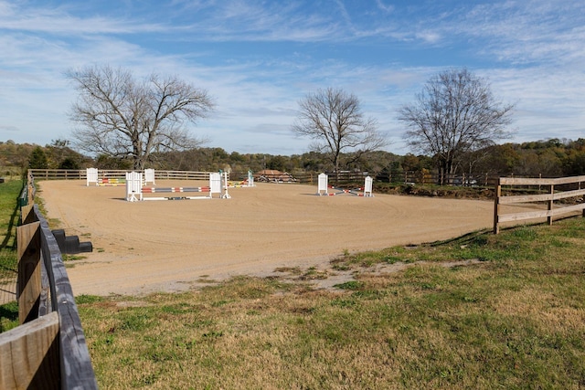 view of yard with a rural view