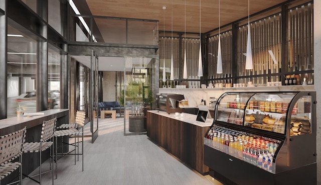 bar featuring dark brown cabinetry and wooden ceiling