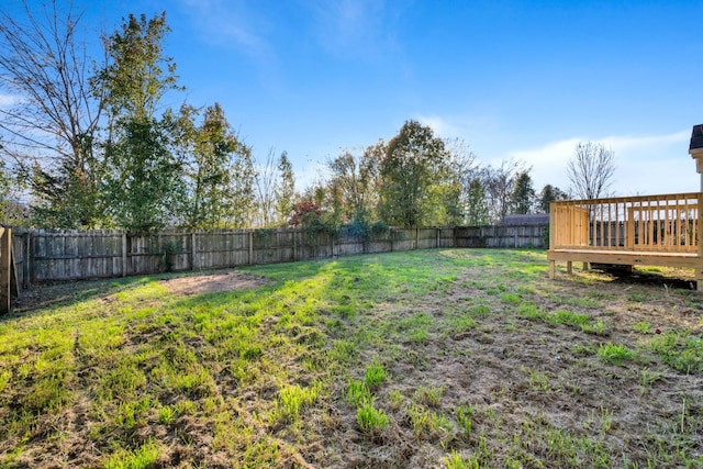 view of yard with a deck