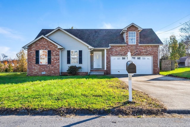 view of front of house featuring a garage and a front yard