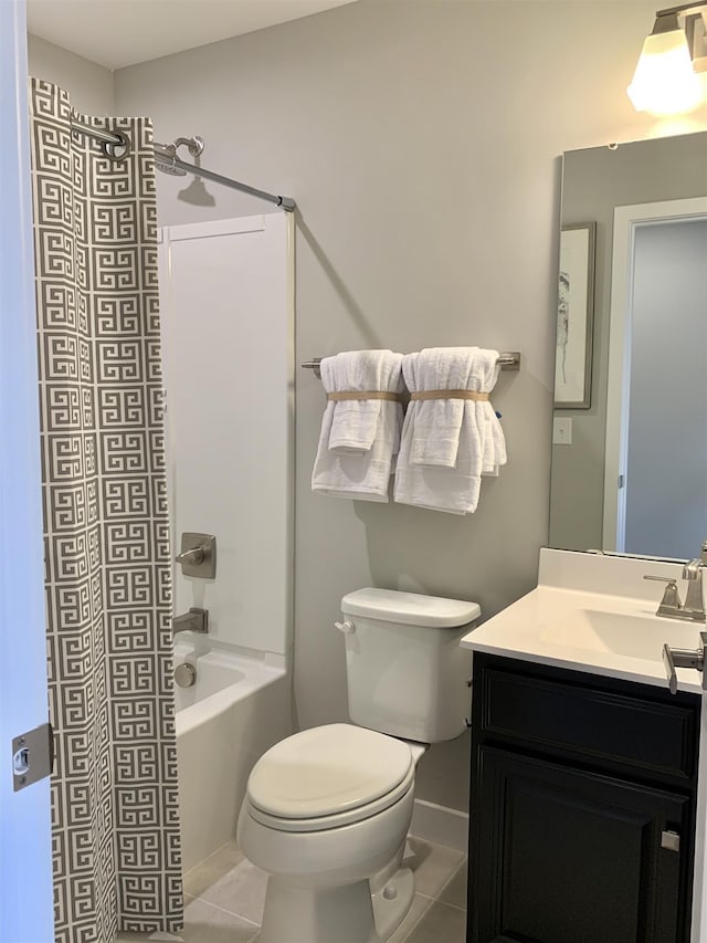 full bathroom with tile patterned flooring, vanity, shower / tub combination, and toilet