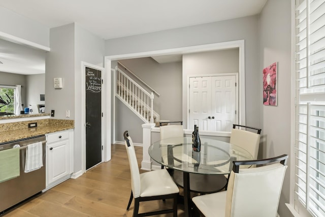 dining space featuring light hardwood / wood-style flooring