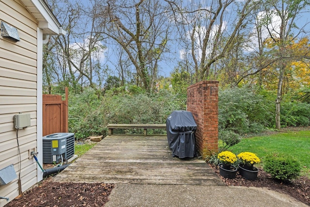 exterior space featuring a grill and central air condition unit