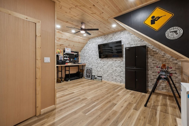 interior space featuring vaulted ceiling, brick wall, hardwood / wood-style floors, and wooden ceiling