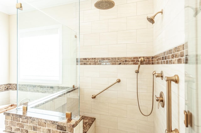 bathroom with tiled shower